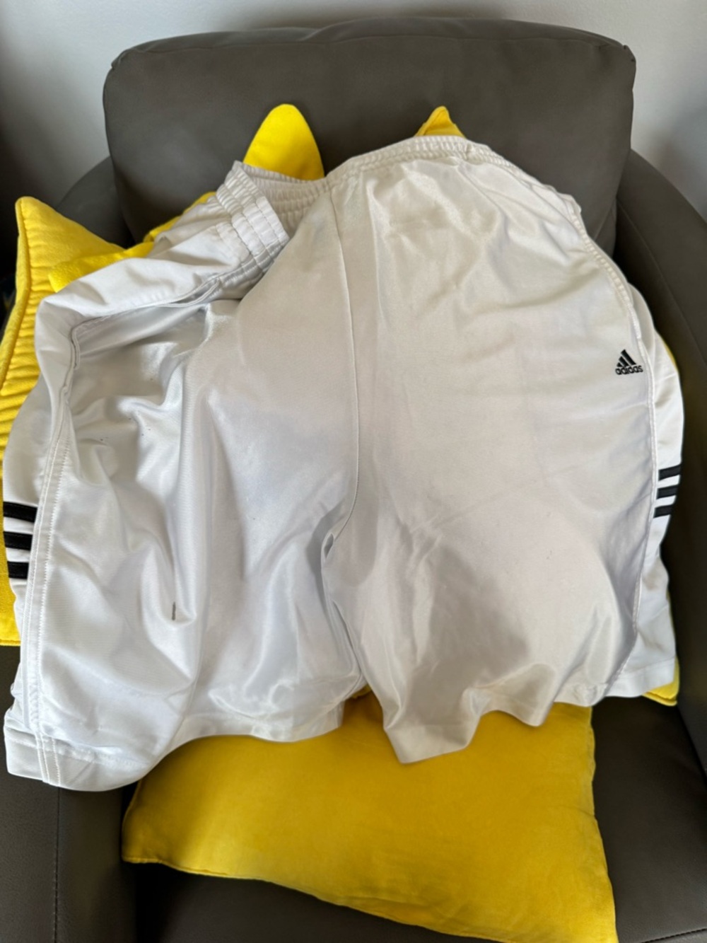 adidas White Boys Athletic Shorts with Black Stripe Detail and orange pair